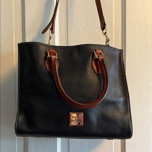 Dooney & Bourke Black and Tan Tote. excellent preowned condition no flaws